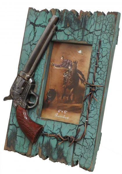 11" x 7.75" Teal faux wood frame with pistol.