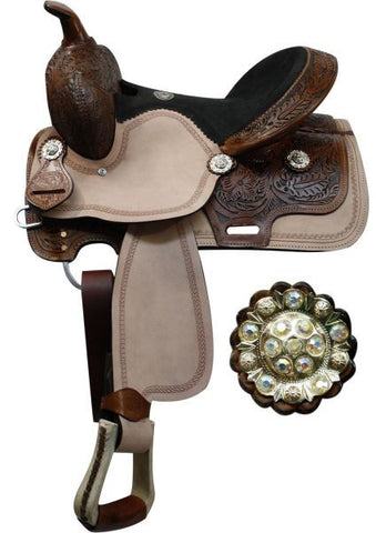 13" Double T youth saddle with floral tooled pommel, cantle, and skirt. Rough out fenders and jockey accented with stitch boarder tooling. Saddle is accented with rhinestone crystal conchos.