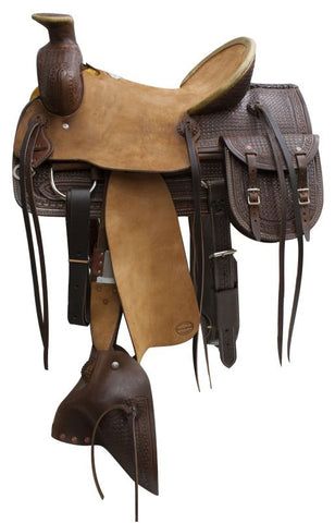 16" Blue River roper saddle with tapederos and saddle bags.