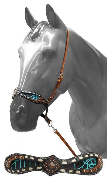 Showman ® Adjustable tie down with teal alligator print inlay and tan buck stitching.