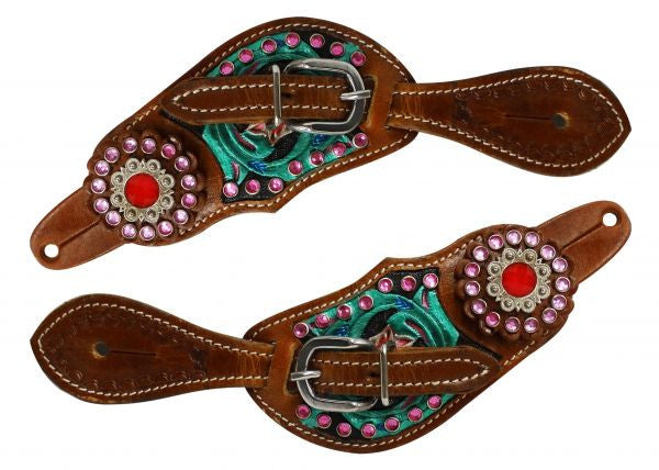 Showman ® Youth size floral tooled spur straps with metallic paint and pink crystals.