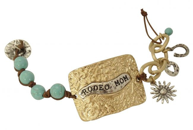 Gold engraved " Rodeo Mom" bracelet.