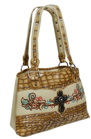 Cream PU leather handbag with embroidered design and cross.