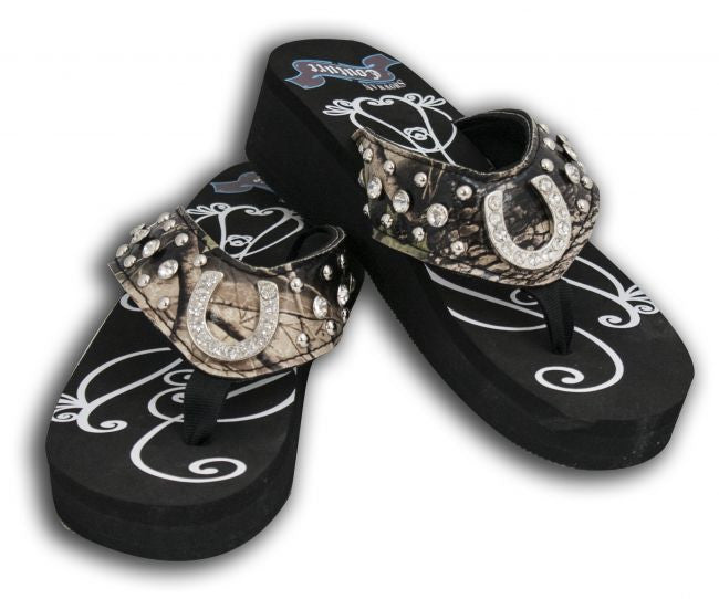 Showman Couture ™ Ladies western bling flip flops with horse shoe conchos and camo print band.