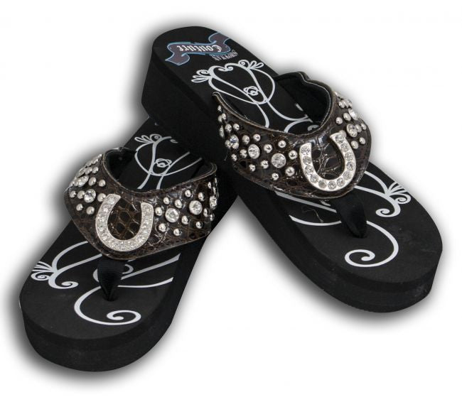 Showman Couture ™ Ladies western bling flip flops with horse shoe conchos and snake print band.