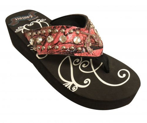 Showman Couture ™ Ladies western flip flops with pink camo and pink crystal rhinstone crossed guns concho.
